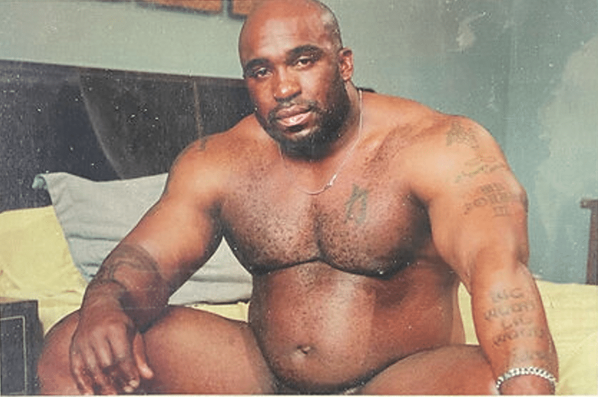 wood sitting on a bed