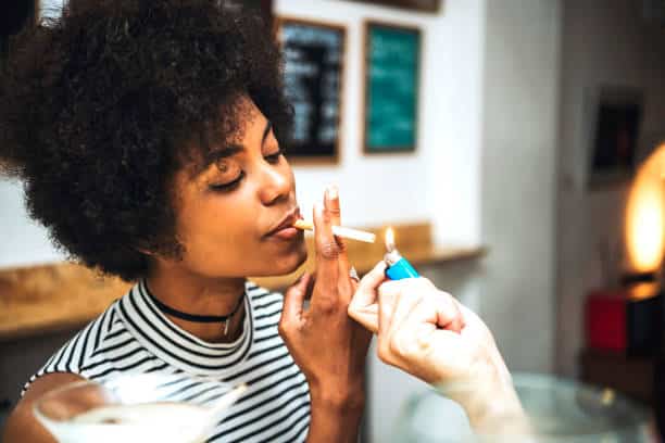 can smoking cause back pain
