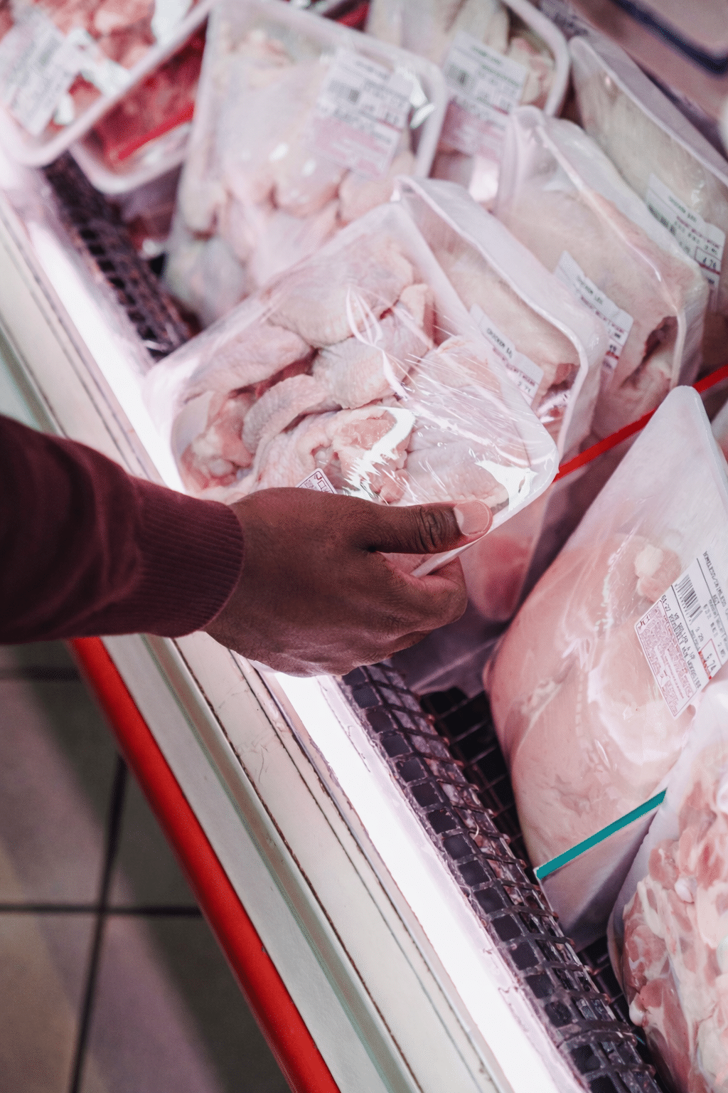 Photo by Kevin  Malik: https://www.pexels.com/photo/person-holding-raw-meat-on-a-tray-9016811/

Edited with AI
