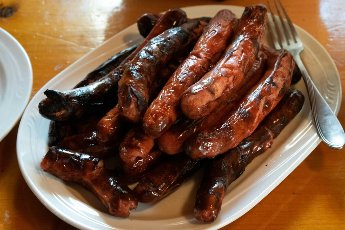 Unappealing hot dogs
Original image: https://unsplash.com/photos/fried-sausage-on-white-ceramic-plate-NJ6UUpxssdI
